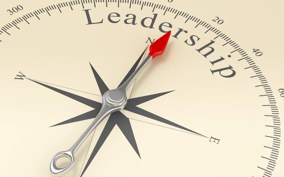 a compass pointing to leadership